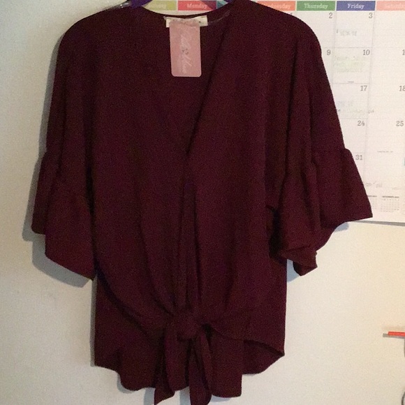 Tops - SOLD. Wind flutter sleeve top